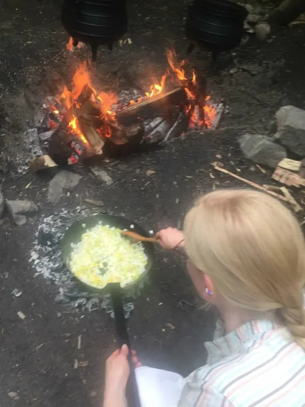 Jessica Cooking over fire