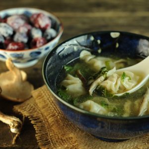 mini wonton soup with asian vegetables