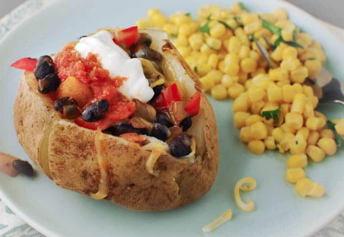 15 Ideas For Baked Potato Toppings To Liven Up Plain Baked Potatoes