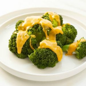 Steamed Broccoli with Cheddar Cheese Sauce