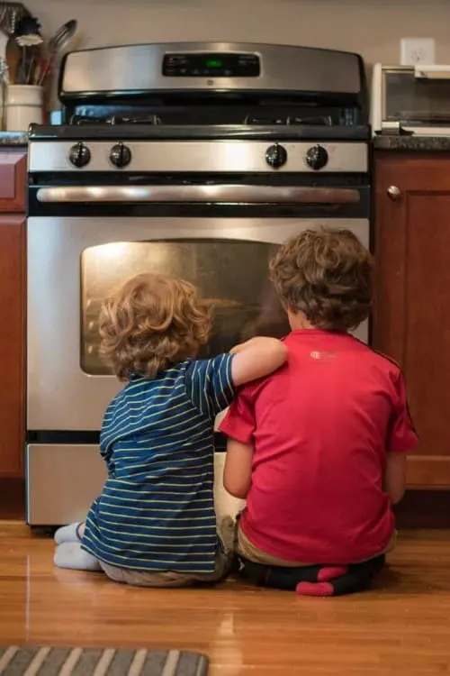 kids watching oven