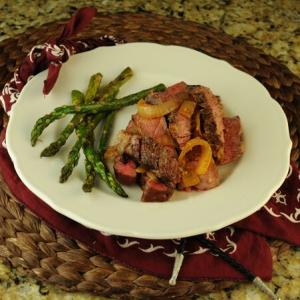 Campfire Steaks with Smoky Onions