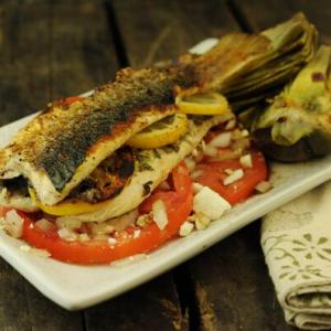 Grilled Trout Stuffed with Fresh Herbs and Lemon Slices