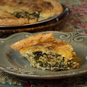 Puffy Golden Quiche with Leeks, Greens, and Baby Swiss