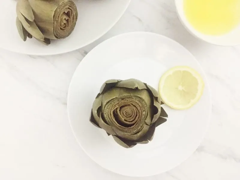 Quick-Steamed Artichokes with Lemon Butter Sauce. A seasonal treat for Passover and Easter. 