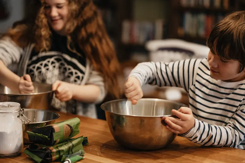 Have picky eaters help with shopping, gardening, cooking, and meal prep