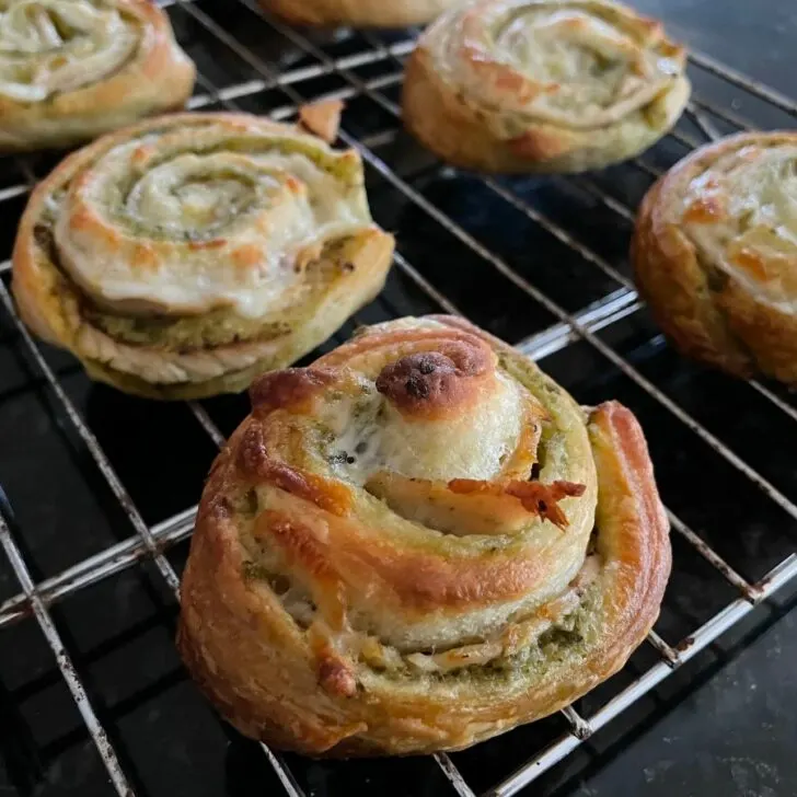 baked turkey-pesto pinwheels on cooling rack