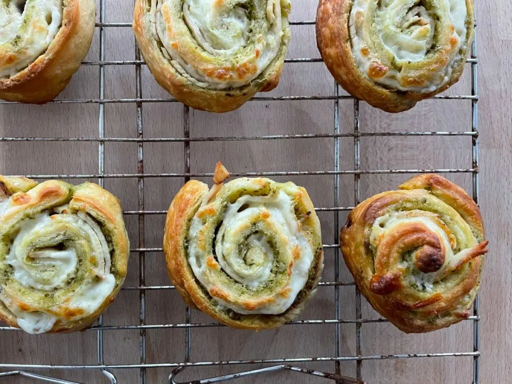 baked pinwheels on cooling rack