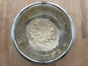 dry ingredients with cubed butter