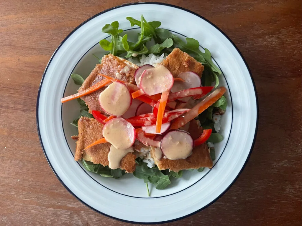 baked tofu veggie bowls with peanut sauce and rice