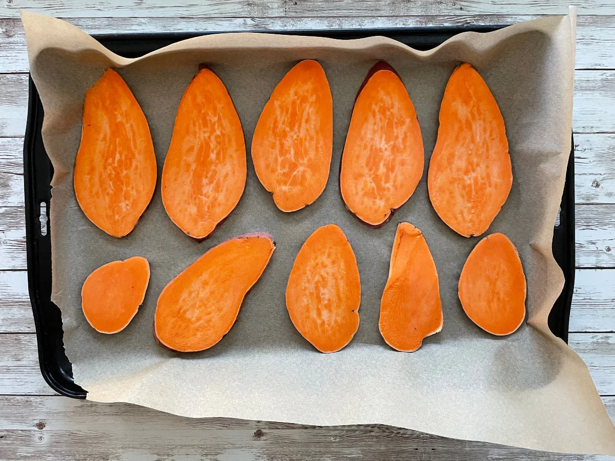 sweet potato slices on parchment paper